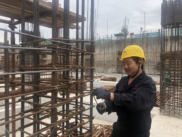 按下快門，定格建設(shè)施工一線最美身影